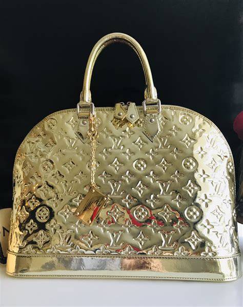 gold lv purse|louis vuitton quilted purse.